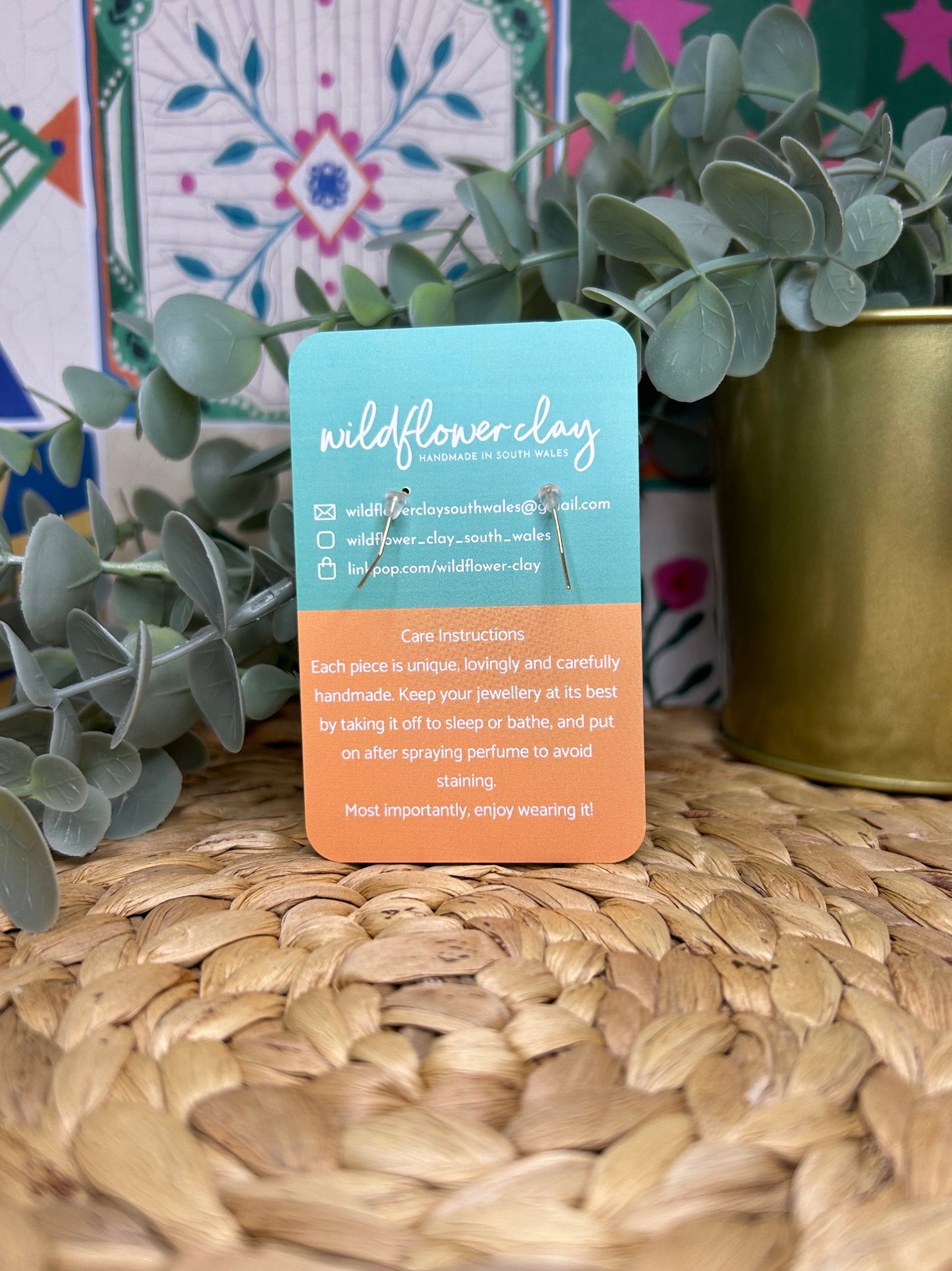 Pink and gold brass triangle